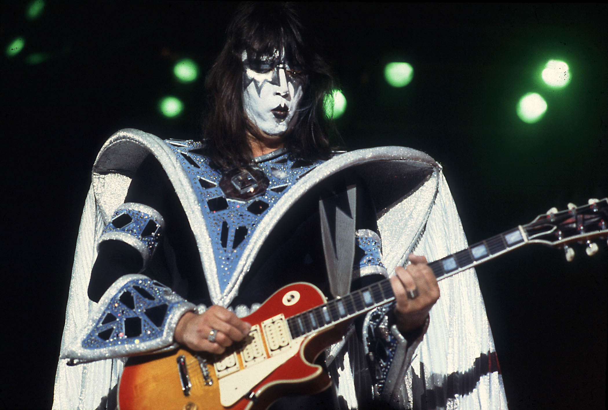 Ace Frehley in full Spaceman mode plays his triple-humbucker Les Paul Custom
