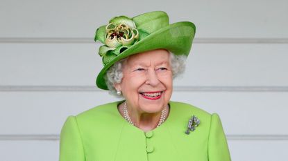 Queen Elizabeth attends the Out-Sourcing Inc. Royal Windsor Cup polo match