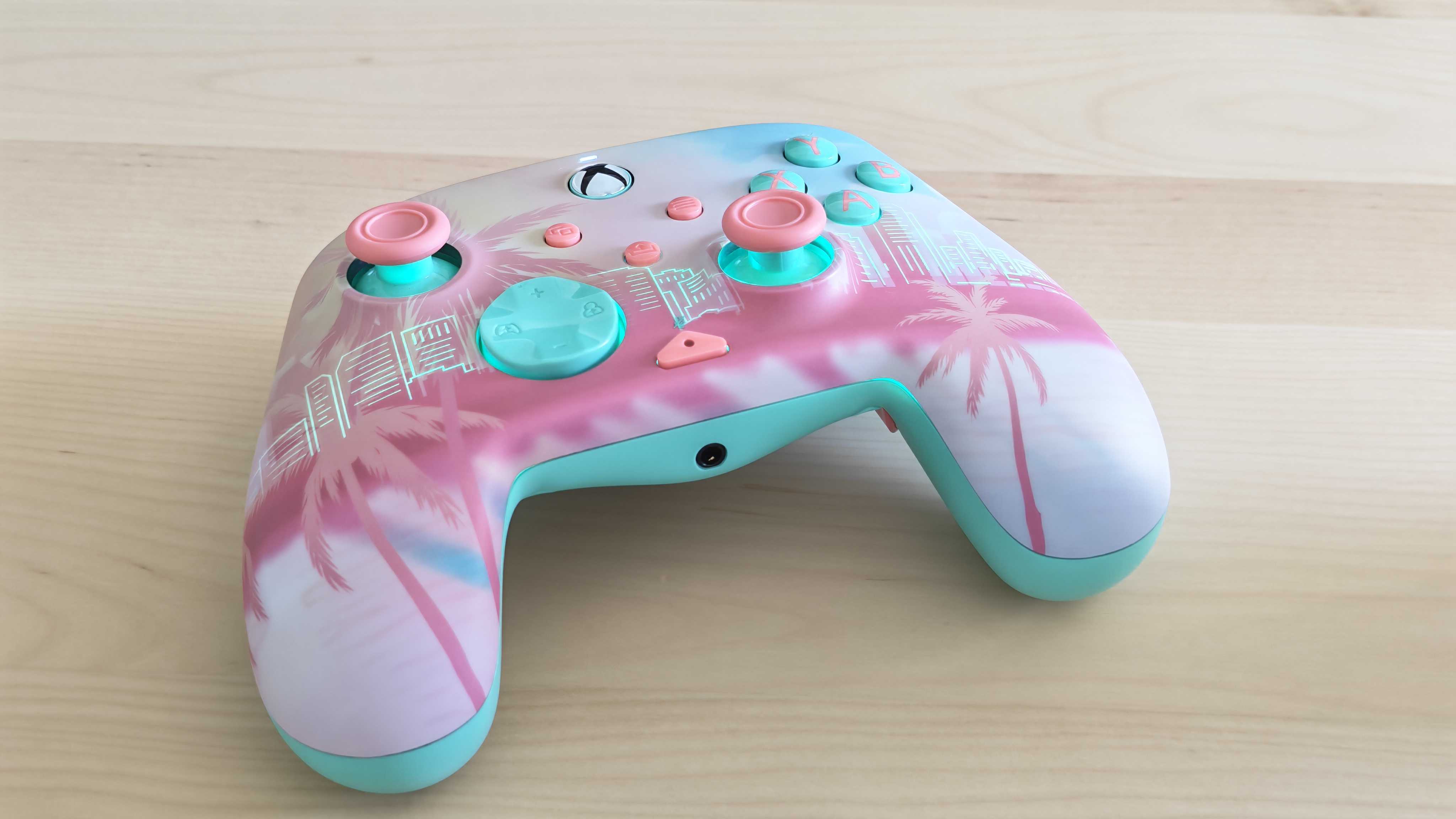 The Turtle Beach Pacific Skyline Wireless Controller on a clean wooden surface.