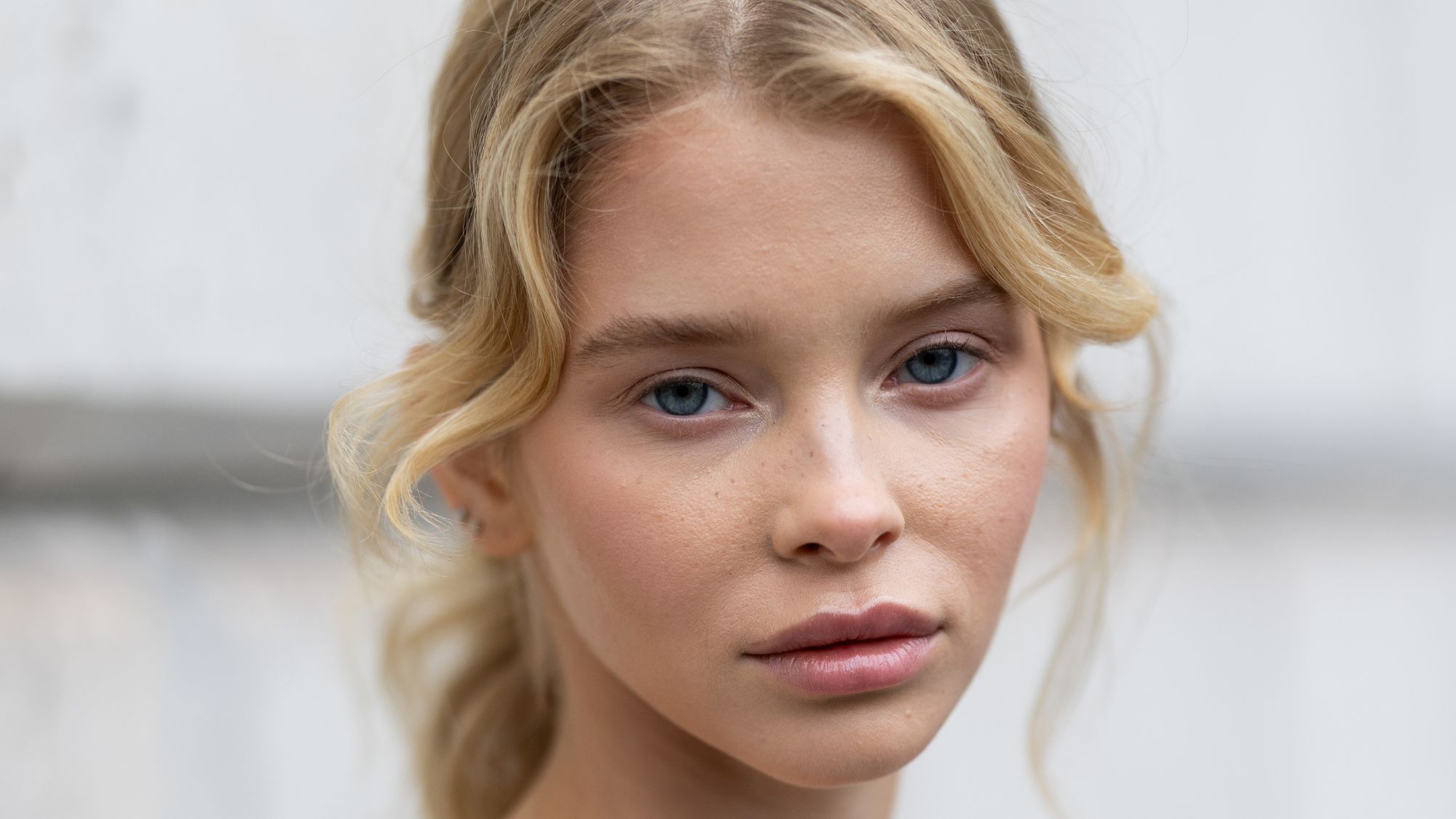 blonde woman with perfectly clear skin