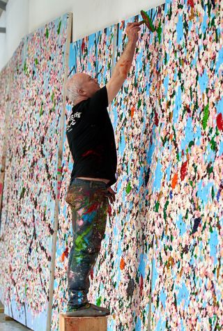  Damien Hirst painting cherry blossoms in his studio