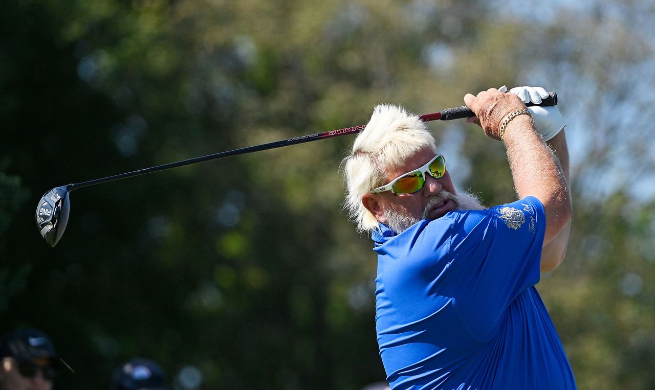 Daly hits a driver off the tee