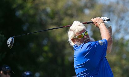 Daly hits a driver off the tee