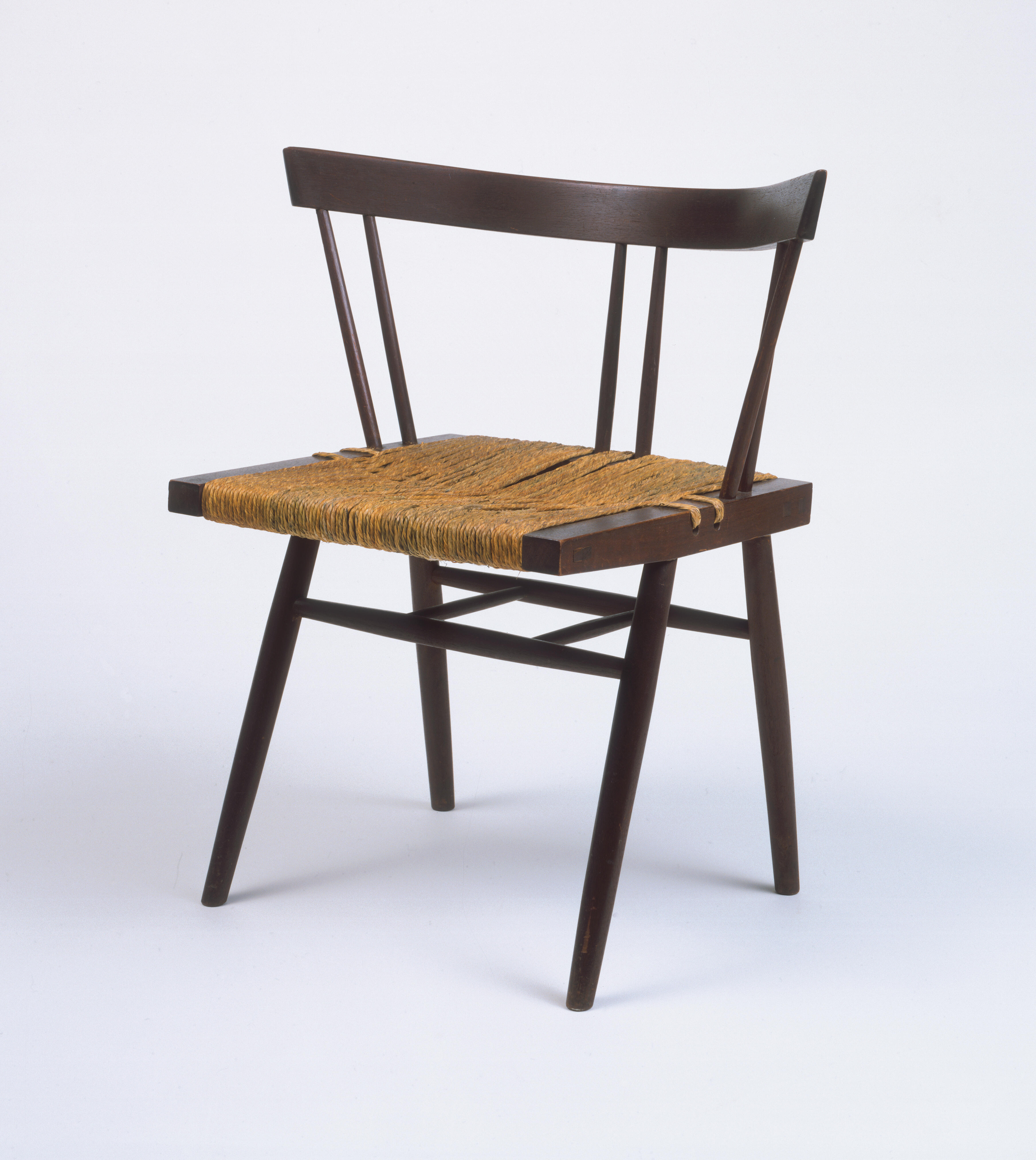 wooden chair with grass seat