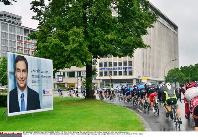 A local politicians billboard is of little interest to the peloton