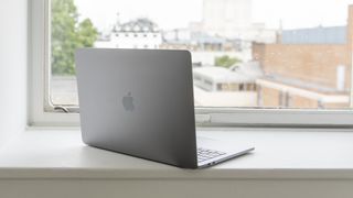 The Apple MacBook Pro 13in (2018) from the rear with the lid open