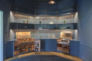 Sandelsandberg stockholm apartment kitchen with blue cabinets