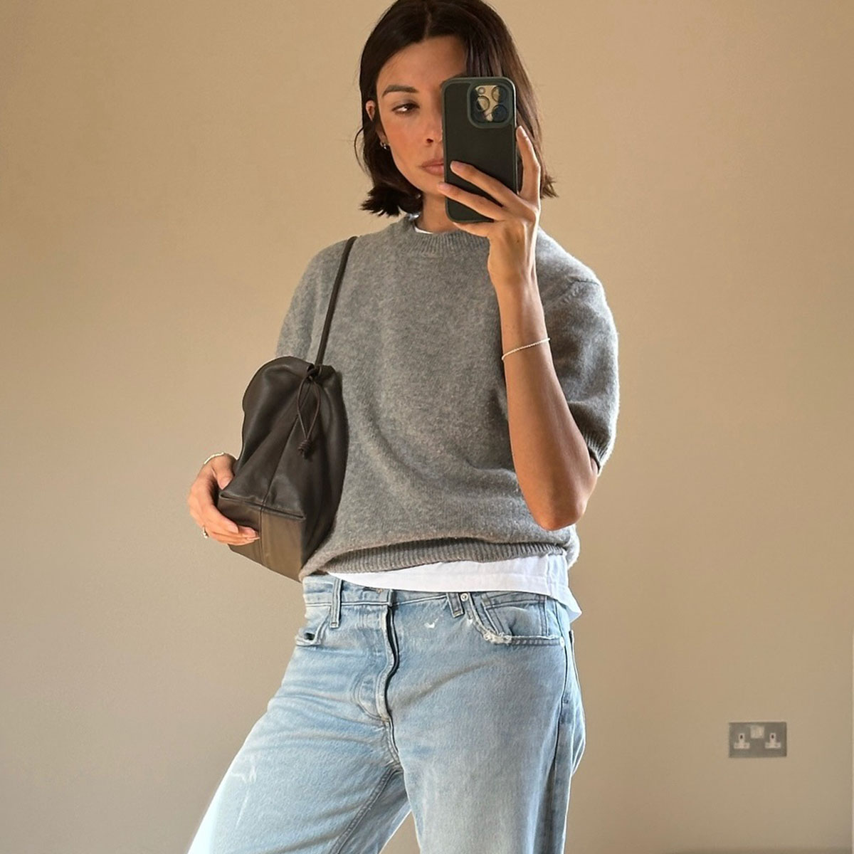 Woman in a sweater and jeans