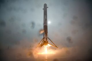 A SpaceX Falcon 9 rocket booster approaches the droneship Just Read The Instructions during a landing attempt in the Pacific Ocean on Jan. 17, 2016 after the successful launch of the Jason-3 ocean satellite.
