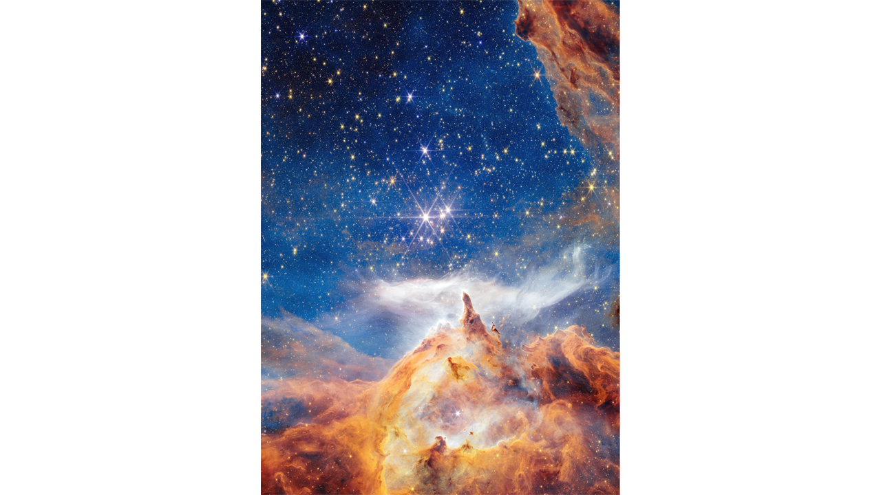 Glowing clouds of orange and blue dust swirl around three bright stars