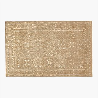 beige rug with subtle pattern