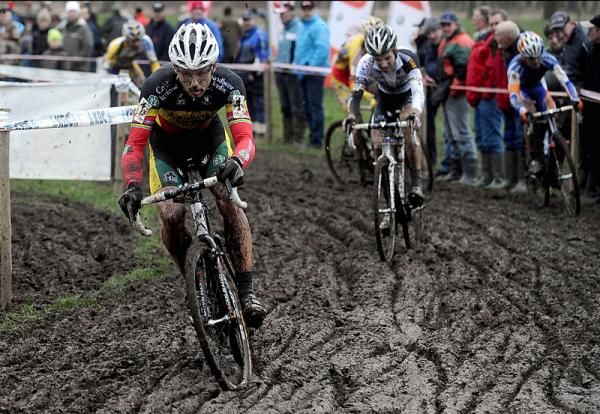 Sven Nys rides away from Niels Albert.
