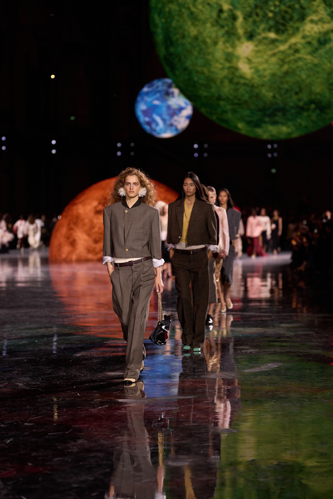 A Chanel model walks the runway.