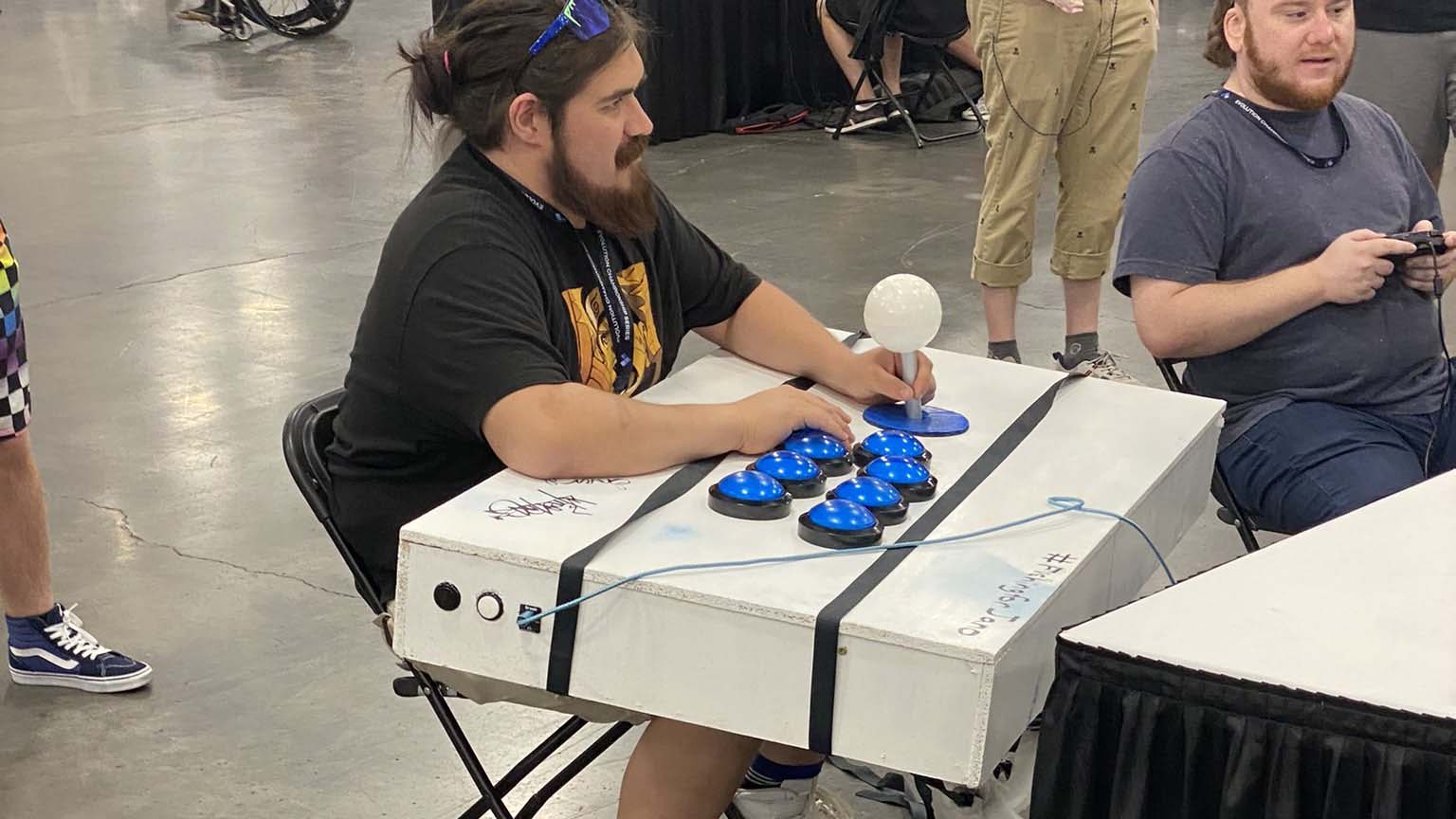 Huge respect to the creator of the EVO 2023 fightstick so unwieldy they had  to carry it around on their back