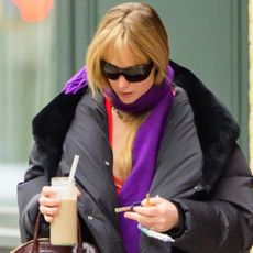 Jennifer Lawrence was spotted in New York wearing a puffer coat, a $33,000 The Row bag, and Ugg slippers