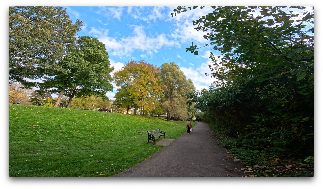 Screen grabs of test footage shot on the GoPro Hero13 Black showing an outdoor park scene.