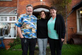 TV tonight: Alex with Hostel owners Sean and Janine.
