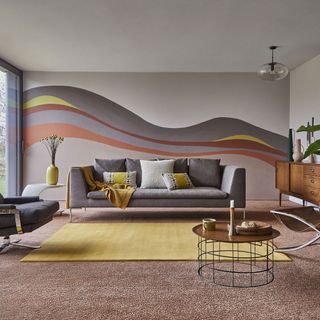 Living room with painted wall mural with coloured Carpetright Ardent carpets