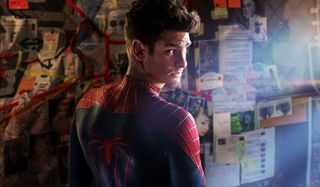 The Amazing Spider-Man Andrew Garfield looks back from his evidence wall in his Spidey suit
