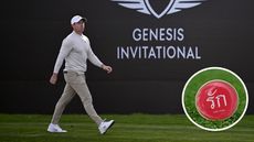 Rory McIlroy walks down the fairway and a picture of a red pin badge in a circle