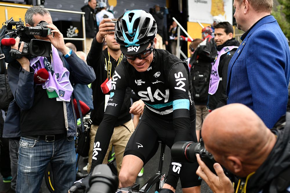 Chris Froome draws a crowd after stage 2 at the Tour de France