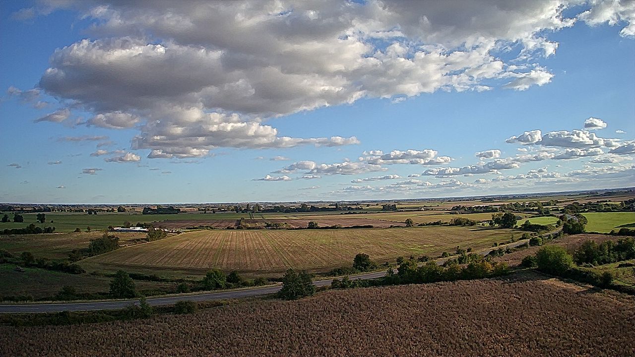 View of a field and clouds taken with Ruko U11MINI drone.