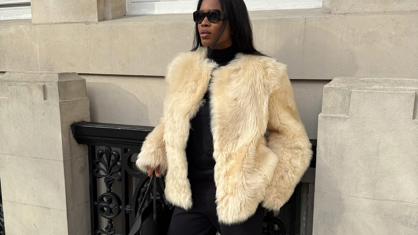 Marilyn NK in a cream faux fur jacket