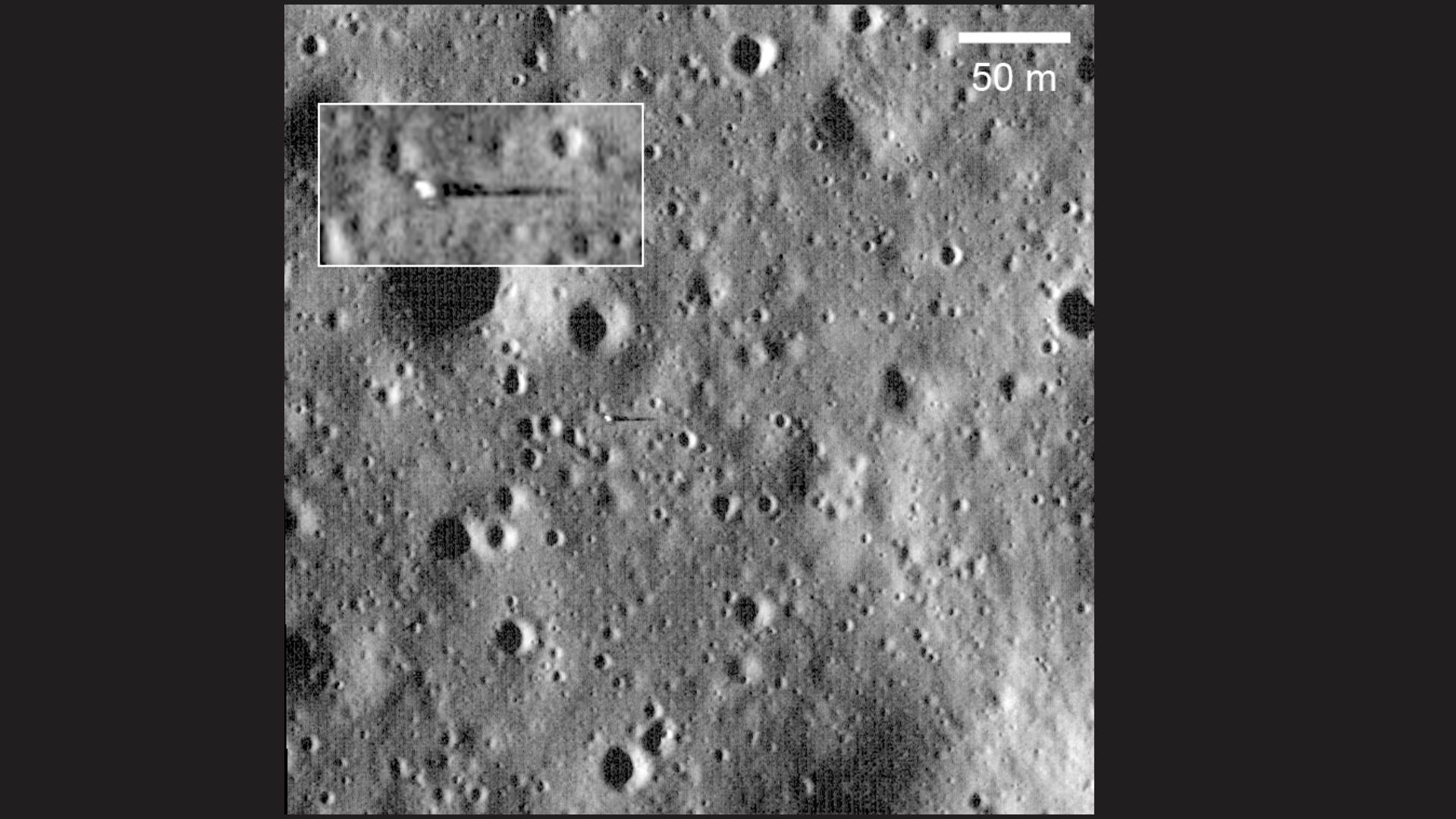 A close up grayscale image of the moon's surface with a white box showing where the Surveyor 6 spacecraft is