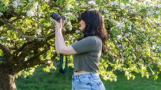 woman using a beginner camera