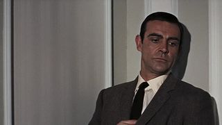 Sean Connery's James Bond looks down to his left in Thunderball
