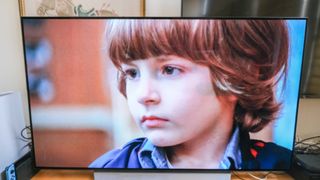 Danny Lloyd as Danny Torrance in The Shining on a TV connected to the Fire TV Cube (2022)