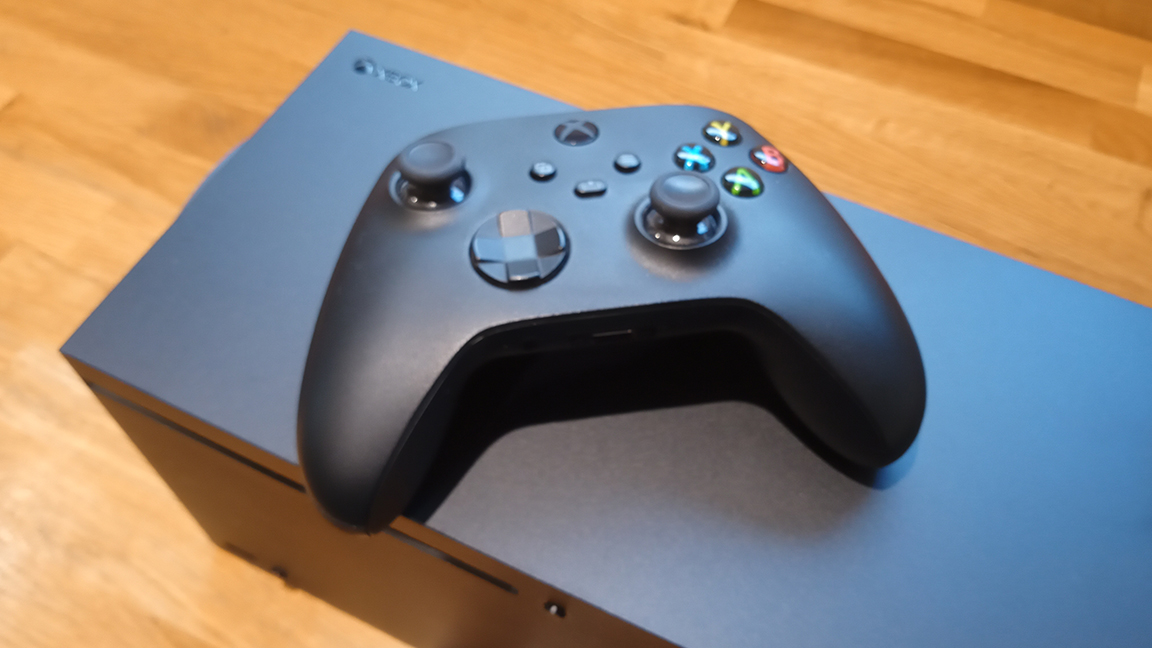 Xbox Series X review; a controller on a black games console