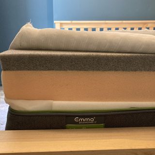 Emma Select Diamond sponge mattress layers on a wooden bed frame