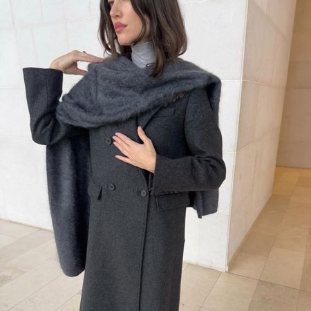 Ilirida Krasniqi in a grey Aritzia coat and scarf
