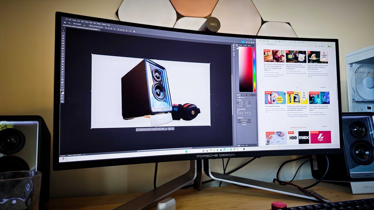 An AOC AGON PD34 monitor on a desk