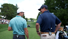 Rory McIlroy and Johnson Wagner chat on a tee box