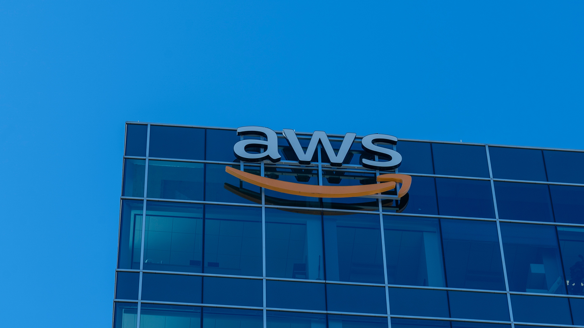 Close up of aws (Amazon Web Services) logo sign on their office building in Houston, Texas, USA
