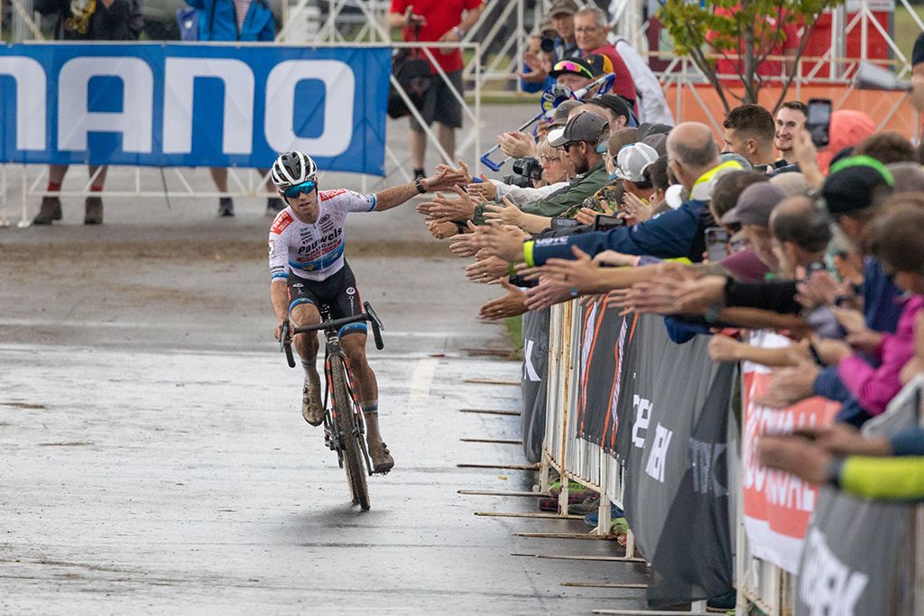 Eli Iserbyt with time to take congratulations from the crowd at the Waterloo UCI Cyclo-cross World Cup men&#039;s elite race 2021