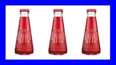 a trio of Campari soda bottles in blue background
