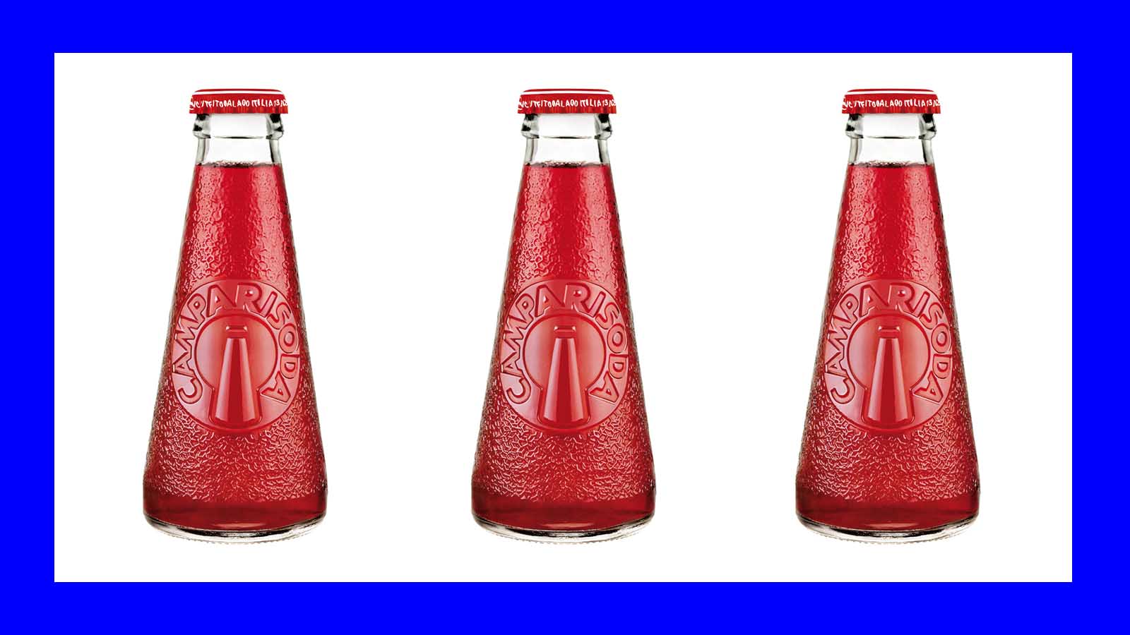 a trio of Campari soda bottles in blue background