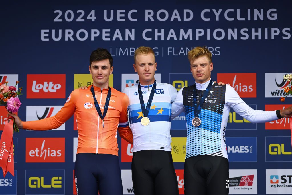 HASSELT BELGIUM SEPTEMBER 15 LR Silver medalist Olav Kooij of Team Netherlands gold medalist Tim Merlier of Team Belgium and bronze medalist Madis Mihkels of Team Estonia pose on the podium during the medal ceremony after the 30th UEC Road Cycling European Championships 2024 Mens Elite Road Race a 2228km one day race from HeusdenZolder to Hasselt on September 15 2024 in Hasselt Belgium Photo by Luc ClaessenGetty Images