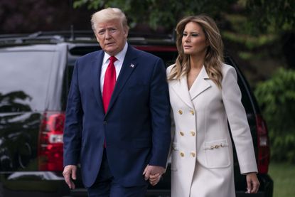 A video of Melania Trump pulling her hand away from Donald is going