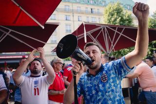 Fans of England enjoy the pre match atmosphere as they sit in the stands prior to the UEFA EURO 2024 final match between Spain and England at Olympiastadion on July 14, 2024 in Berlin, Germany