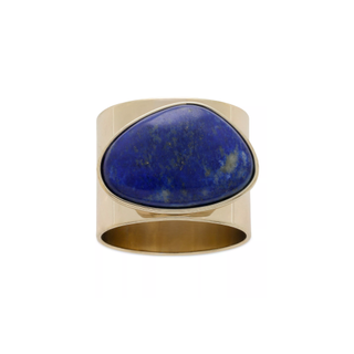 gold napkin ring with a blue stone