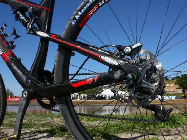 Rocky Mountain's SmoothLink suspension system apparently gets around the Specialized FSR patent by moving the dropout pivot above the rear axle.