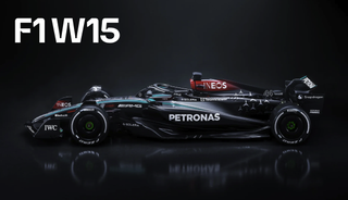 Sleek image of Mercedes F1 AMG W15 car 2024 silhouetted against a dark background ahead of F1 testing 2024