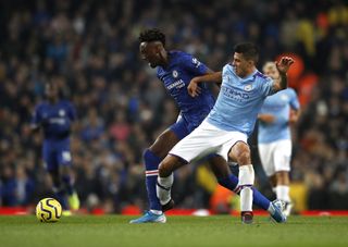 Rodri (right) is determined to battle through City's tough period