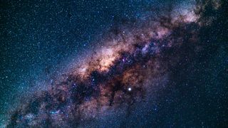 How cold is space beyond the Milky Way 