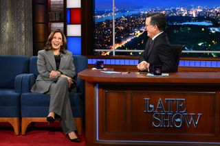 Kamala Harris at the Late Show with stephen colbert wearing a gray suit