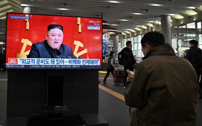 Kim Jong Un appears on a news broadcast.